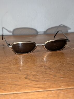 Vintage Oval Sunglasses in Gold Frame with Dark Lenses